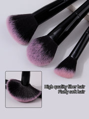 triangular powder puffs included in makeup tool set